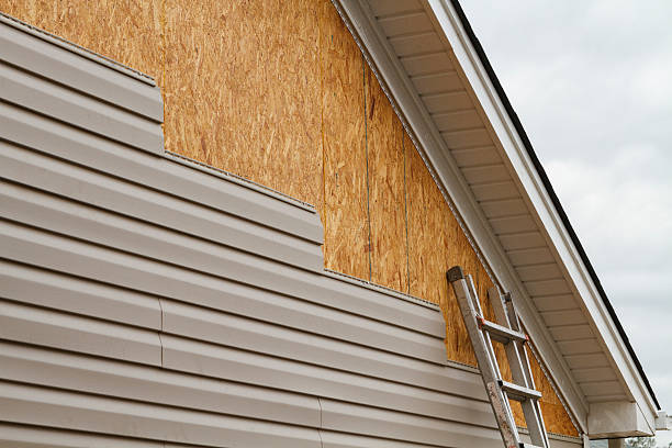 Professional Emergency Siding Repair technician working in Parkhill, PA